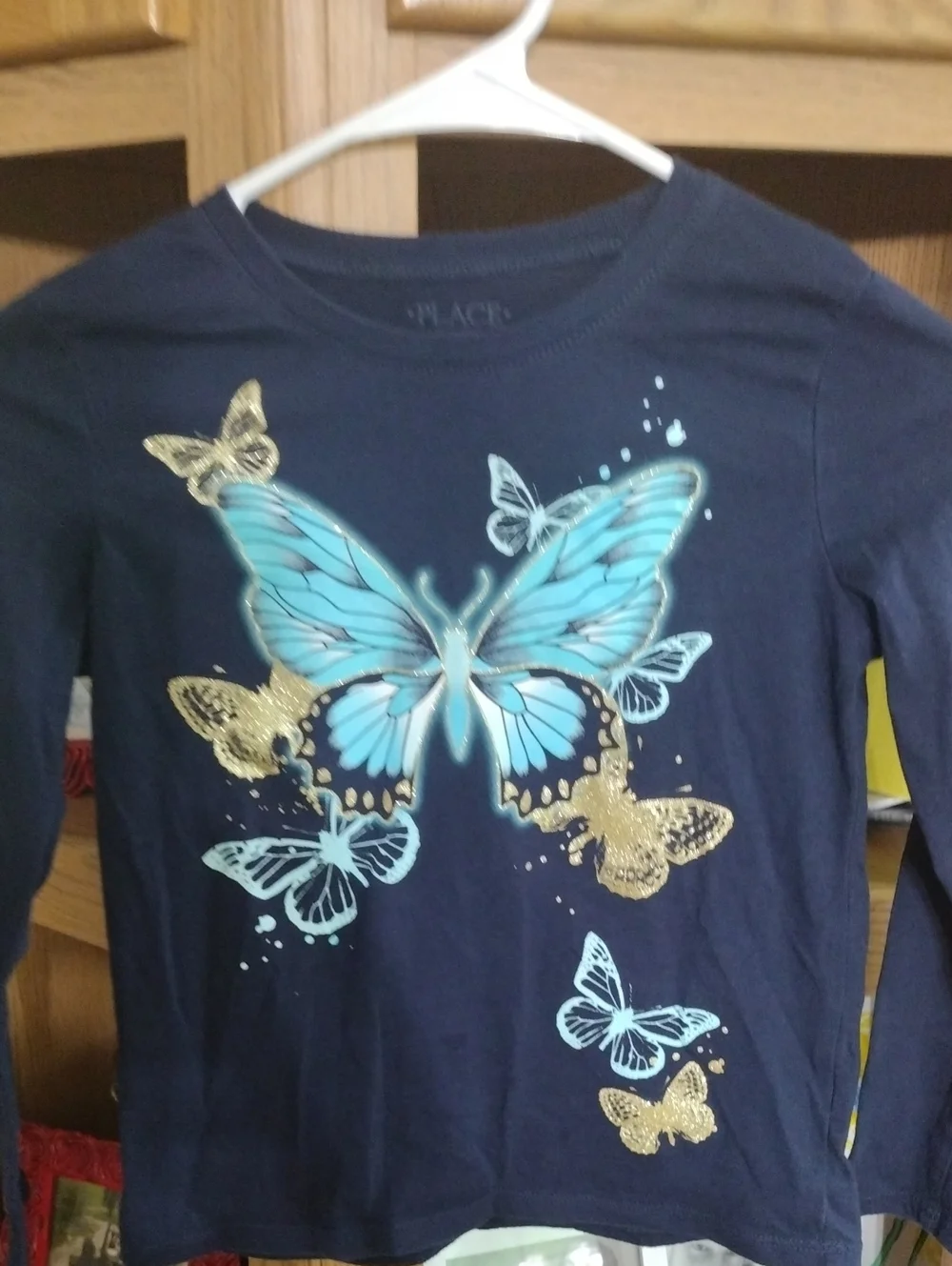 The Children's Place Navy Long Sleeve Tee with Blue and Gold Butterfly Graphic